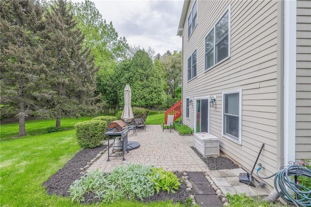 view of patio with a grill