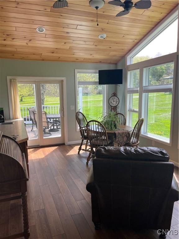 8054 Fargo Rd, Henderson, NY 13650 - living area featuring lofted ceiling, wooden ceiling, a ceiling fan, wood finished floors, and baseboards