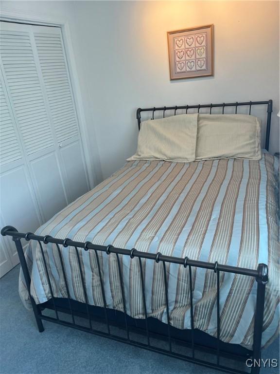8054 Fargo Rd, Henderson, NY 13650 - carpeted bedroom featuring a closet