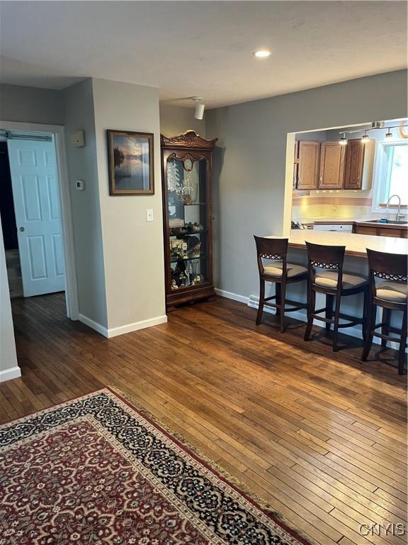 8054 Fargo Rd, Henderson, NY 13650 - dining space with dark wood-style floors, baseboards, and recessed lighting