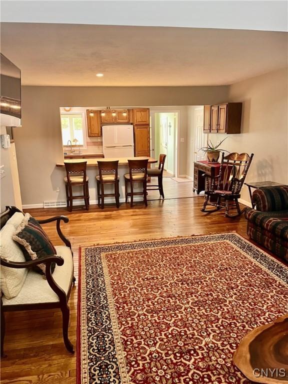 8054 Fargo Rd, Henderson, NY 13650 - living area with wood finished floors and baseboards
