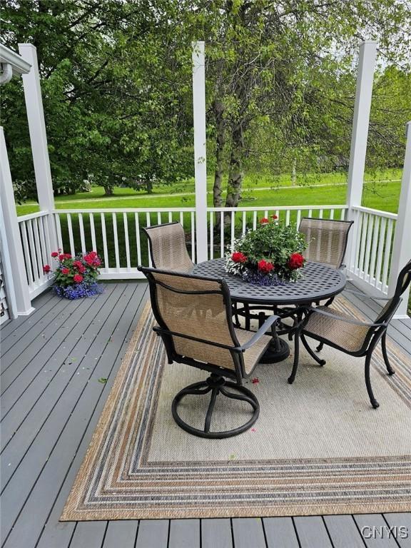 8054 Fargo Rd, Henderson, NY 13650 - wooden deck with view of wooded area