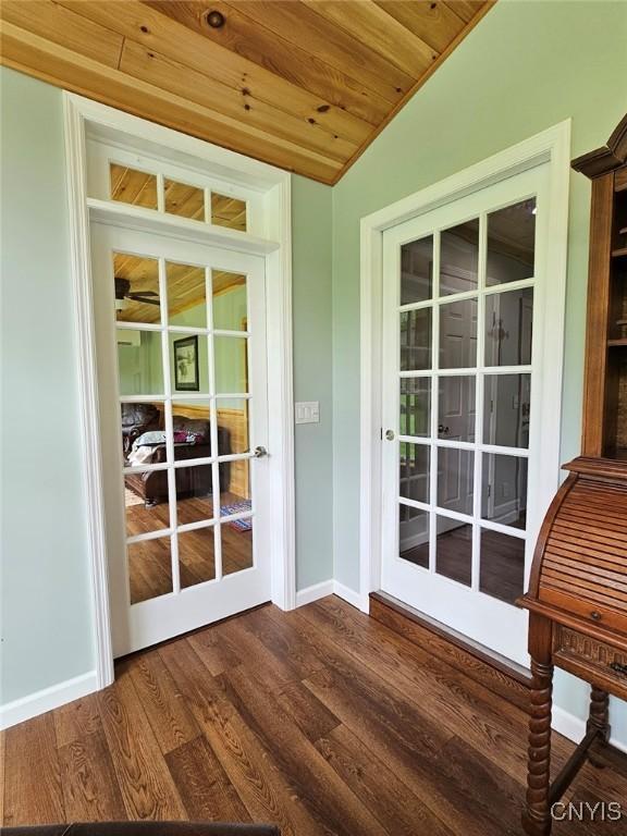 8054 Fargo Rd, Henderson, NY 13650 - entryway with vaulted ceiling, dark wood-style floors, baseboards, and wood ceiling