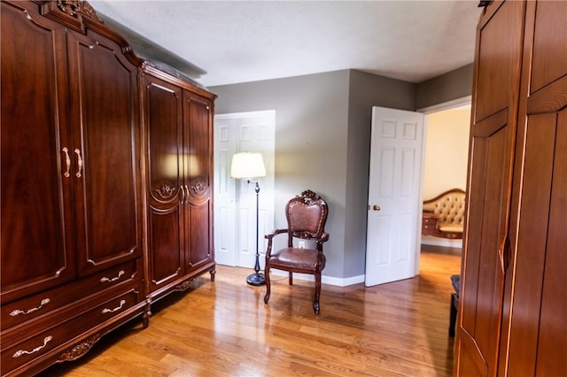 401 Montvale Ln, Greece, NY 14626 - living area featuring wood finished floors and baseboards