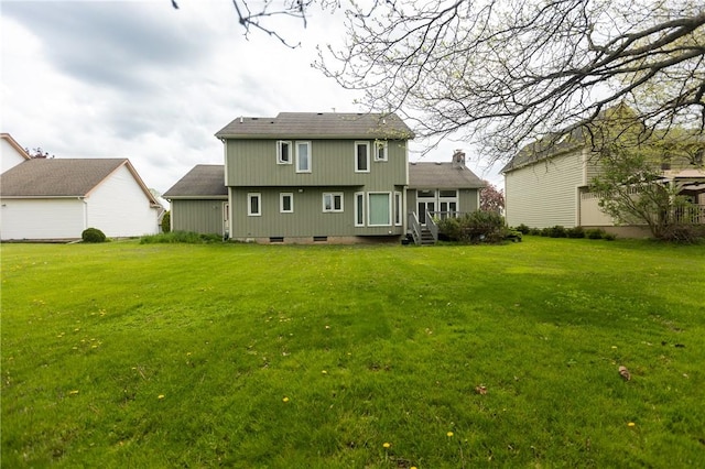 401 Montvale Ln, Greece, NY 14626 - rear view of house featuring a lawn and crawl space