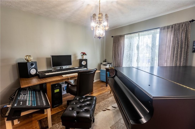 401 Montvale Ln, Greece, NY 14626 - office with wood finished floors, a chandelier, a textured ceiling, and baseboards