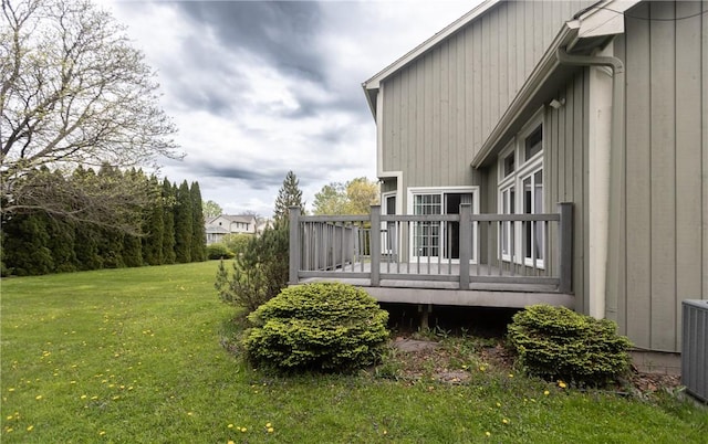 401 Montvale Ln, Greece, NY 14626 - view of grassy yard with a deck and central air condition unit
