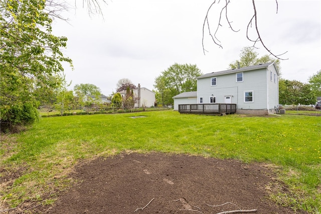view of yard featuring a wooden deck