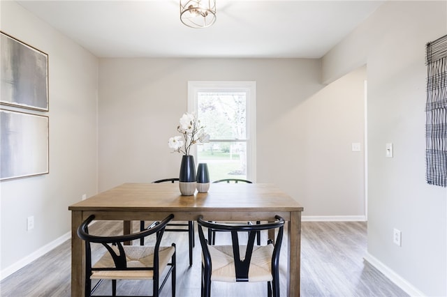 office featuring light wood-style floors and baseboards