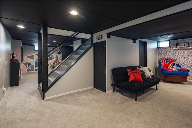 basement featuring carpet, baseboards, recessed lighting, and stairs