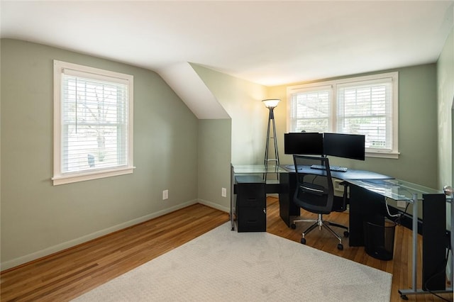office space featuring wood finished floors and baseboards