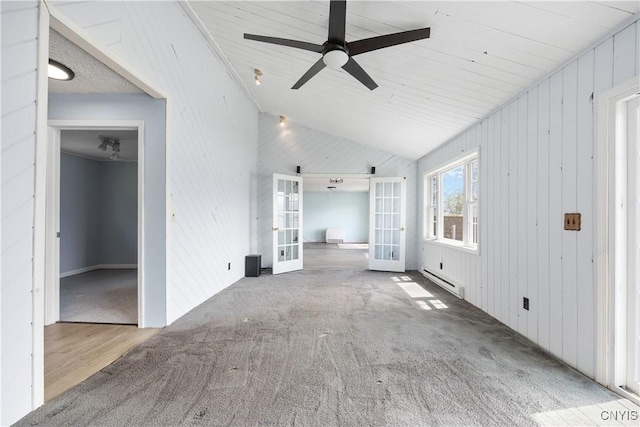 1019 State Route 49, Constantia, NY 13028 - unfurnished living room with french doors, a baseboard heating unit, carpet floors, ceiling fan, and vaulted ceiling