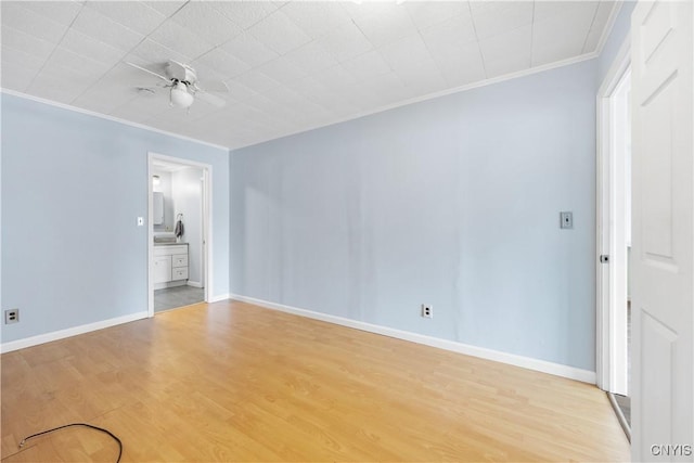 1019 State Route 49, Constantia, NY 13028 - empty room with ornamental molding, wood finished floors, a ceiling fan, and baseboards