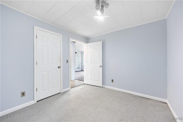 1019 State Route 49, Constantia, NY 13028 - unfurnished bedroom with ornamental molding, carpet, baseboards, and ceiling fan