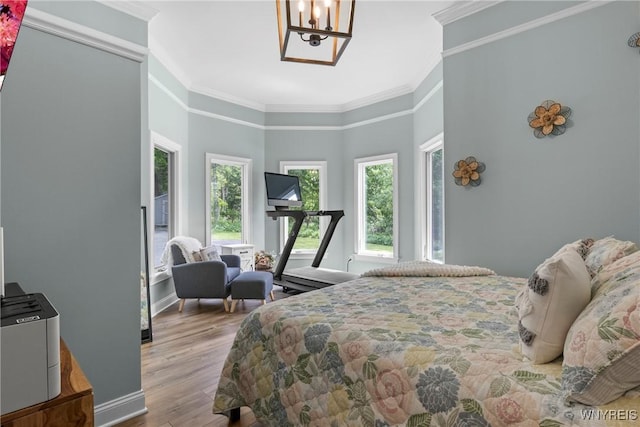 3750 Transit Rd, Orchard Park, NY 14127 - bedroom with a chandelier, ornamental molding, wood finished floors, and baseboards