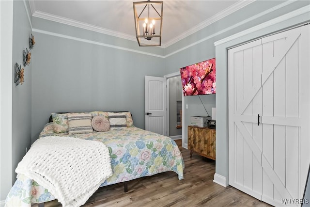 3750 Transit Rd, Orchard Park, NY 14127 - bedroom featuring a chandelier, wood finished floors, crown molding, and baseboards