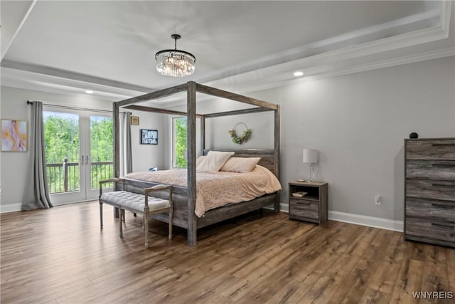 3750 Transit Rd, Orchard Park, NY 14127 - bedroom with access to exterior, wood finished floors, crown molding, a chandelier, and a tray ceiling