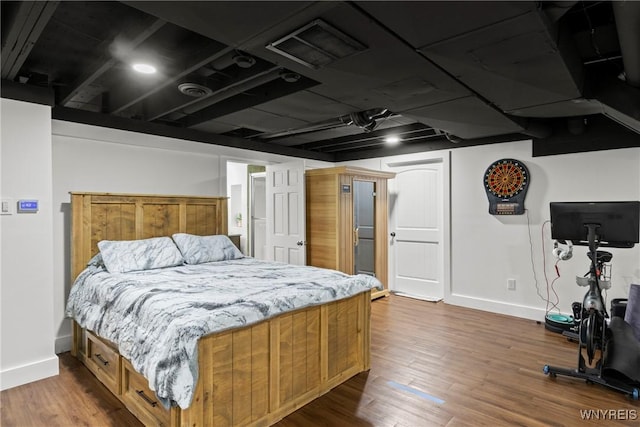 3750 Transit Rd, Orchard Park, NY 14127 - bedroom with baseboards and dark wood-type flooring
