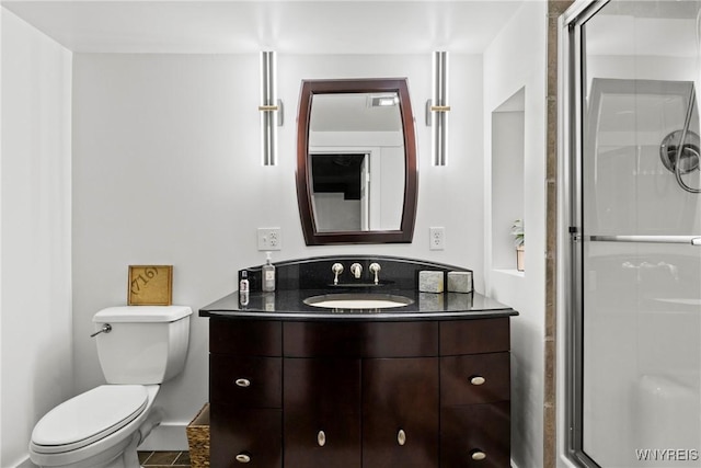 3750 Transit Rd, Orchard Park, NY 14127 - bathroom with a shower stall, vanity, and toilet