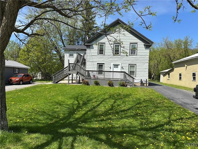 24 W Main St, Eaton, NY 13408 - view of front of house featuring stairs and a front yard