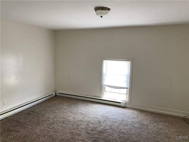 24 W Main St, Eaton, NY 13408 - unfurnished room with carpet floors and a baseboard heating unit