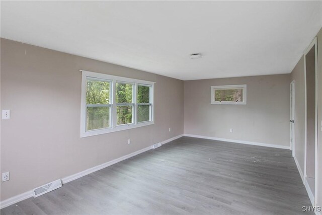 121 Roney Rd, Syracuse, NY 13205 - unfurnished room featuring wood finished floors and baseboards