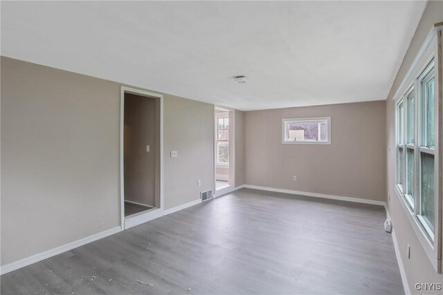121 Roney Rd, Syracuse, NY 13205 - empty room with wood finished floors and baseboards