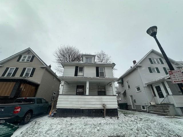 199 Roycroft Dr, Rochester, NY 14621 - view of front facade with a porch