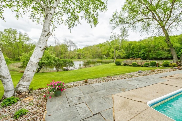 view of patio featuring a water view