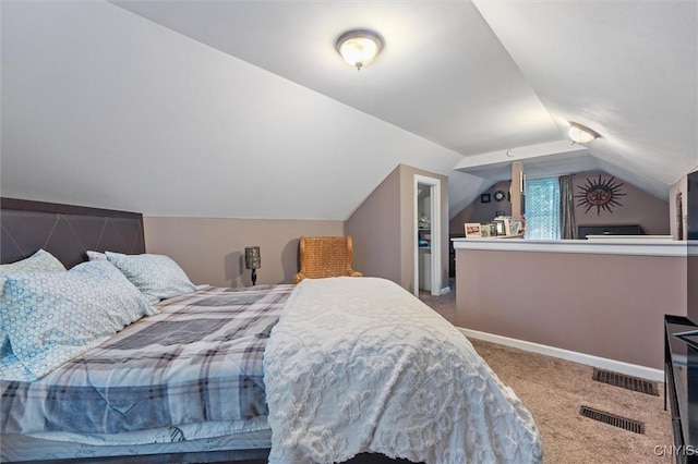 bedroom featuring carpet, lofted ceiling, and baseboards