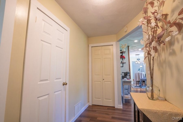 7735 Coates Rd N, Trenton, NY 13354 - hallway with dark wood-type flooring and baseboards