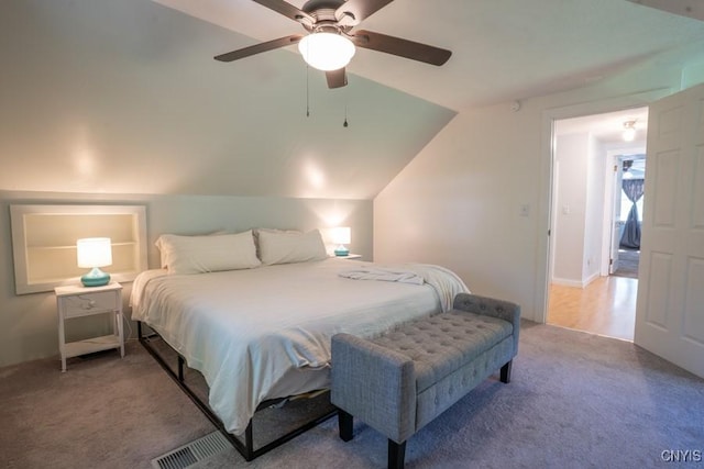7735 Coates Rd N, Trenton, NY 13354 - carpeted bedroom featuring vaulted ceiling and a ceiling fan