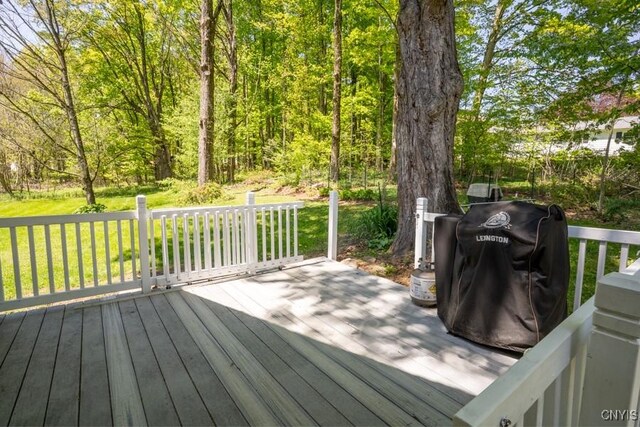 7735 Coates Rd N, Trenton, NY 13354 - wooden deck featuring a lawn and area for grilling