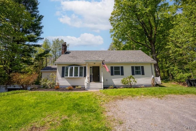 7735 Coates Rd N, Trenton, NY 13354 - view of front of property featuring a front lawn and a chimney