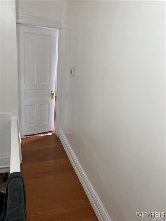 428 Tonawanda St, Buffalo, NY 14207 - hall with dark wood-style flooring and baseboards