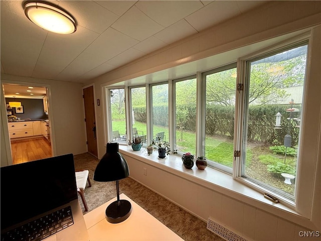 living room with plenty of natural light