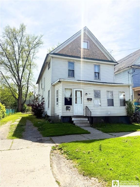 99 King St, Dunkirk-City, NY 14048 - american foursquare style home featuring entry steps and a front lawn