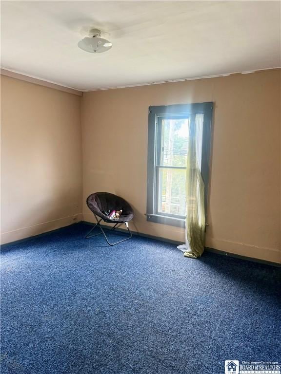 99 King St, Dunkirk-City, NY 14048 - carpeted empty room featuring baseboards and crown molding