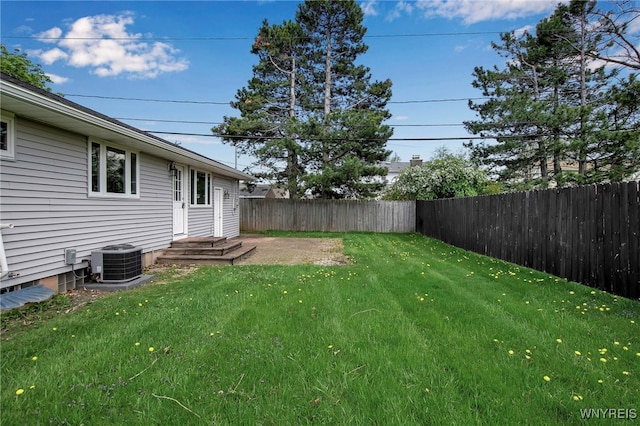 view of yard with central AC