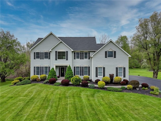 view of front of home with a front yard