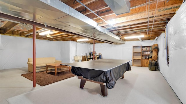 rec room with concrete floors