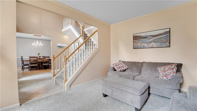 carpeted living area featuring stairway, a chandelier, ornamental molding, and baseboards