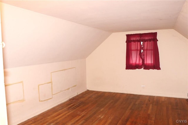 bonus room featuring hardwood / wood-style flooring and lofted ceiling