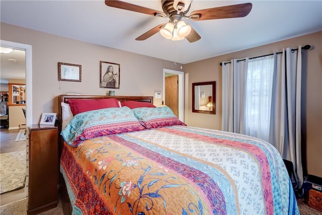 bedroom featuring ceiling fan