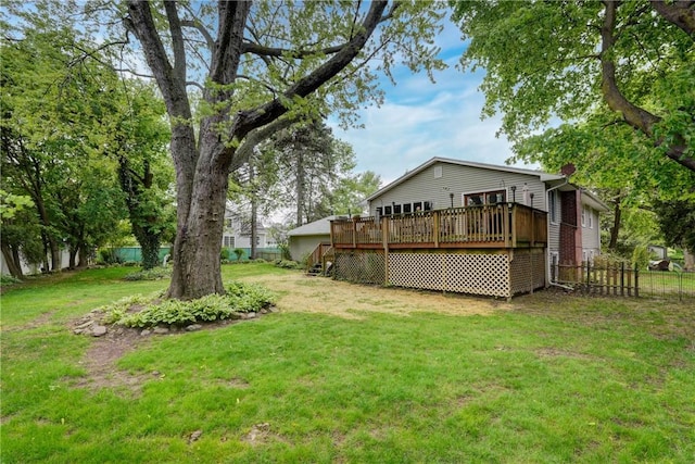 view of yard featuring a wooden deck