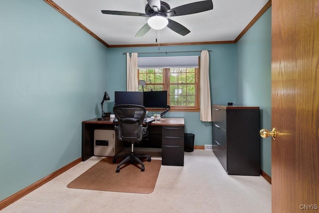 home office with crown molding, a ceiling fan, baseboards, and carpet floors