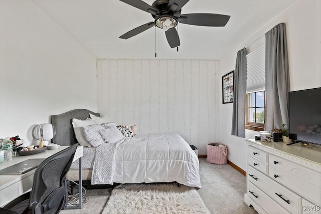 carpeted bedroom featuring a ceiling fan