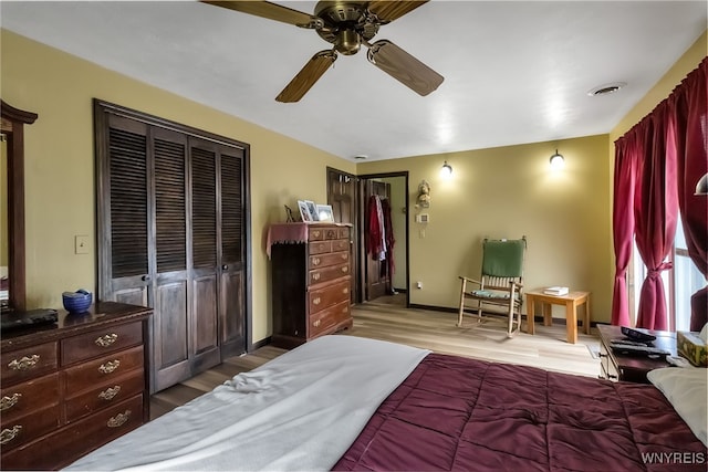 353 Campbell Rd, Sweden, NY 14420 - bedroom featuring wood finished floors, a ceiling fan, baseboards, and a closet