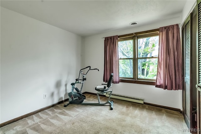 353 Campbell Rd, Sweden, NY 14420 - workout room featuring carpet floors, a baseboard heating unit, and baseboards