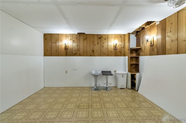 353 Campbell Rd, Sweden, NY 14420 - finished basement with wood walls and tile patterned floors